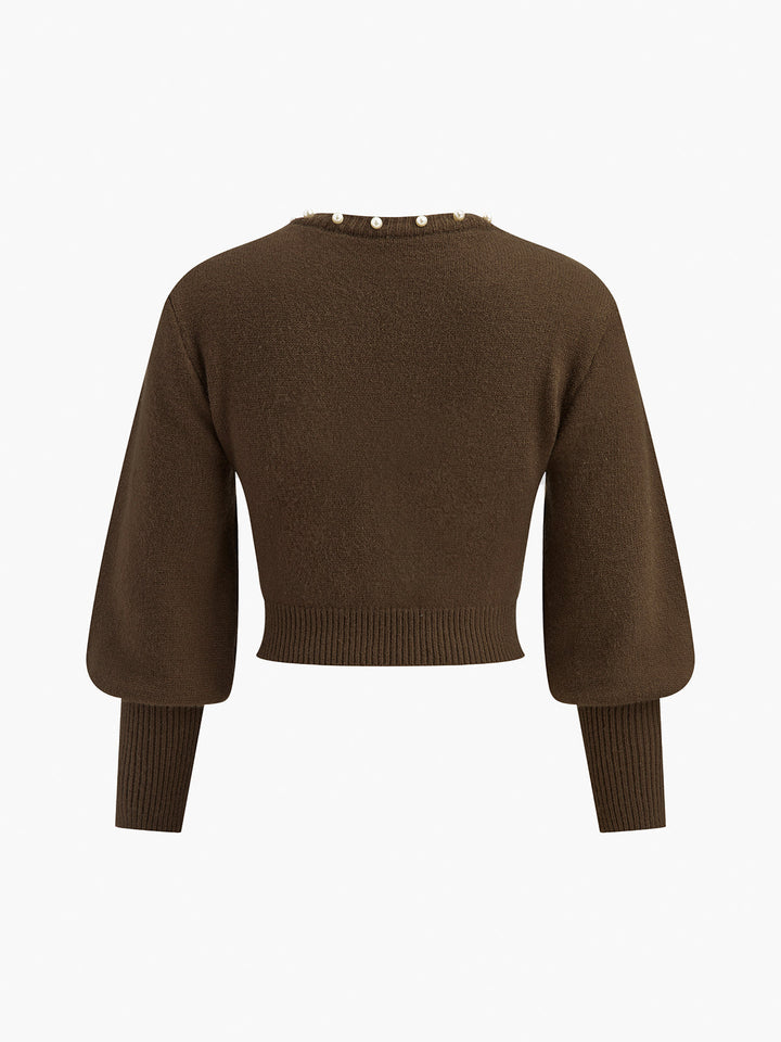 Haut en tricot à manches lanterne avec bordure en perles