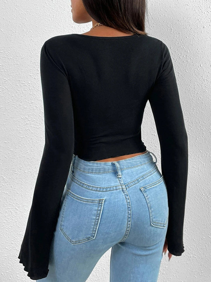 Haut en jersey asymétrique à encolure cœur nouée