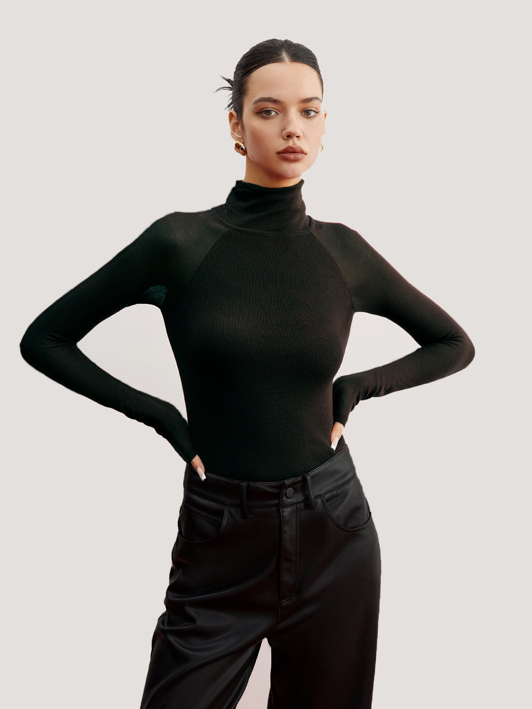 Pull ajusté à manches transparentes