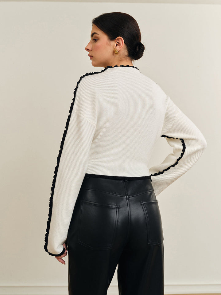 Haut en tricot à bordure festonnée