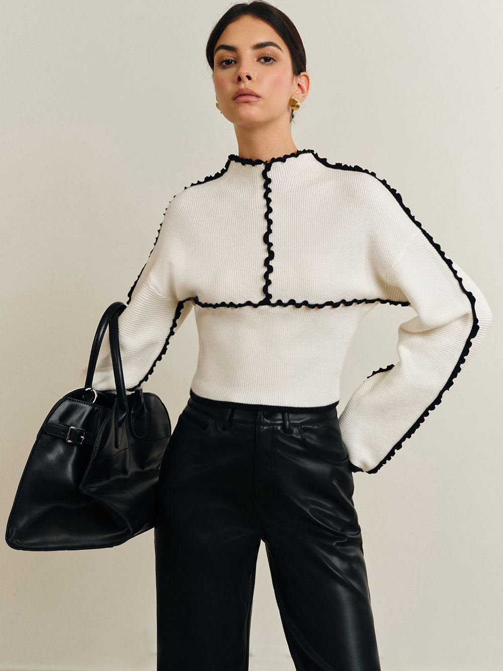 Haut en tricot à bordure festonnée