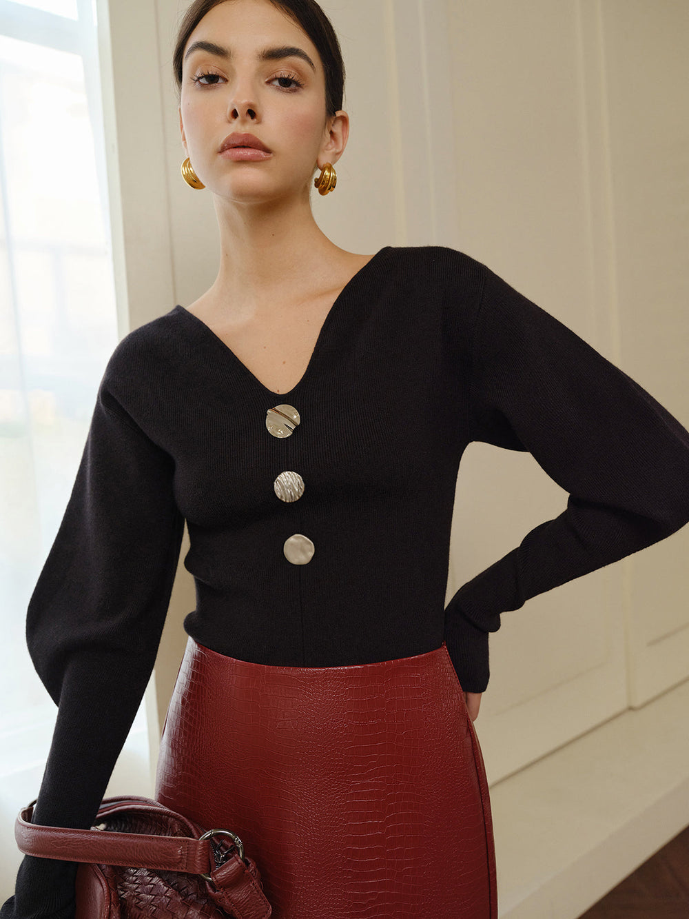 Pull à manches bouffantes à col en V