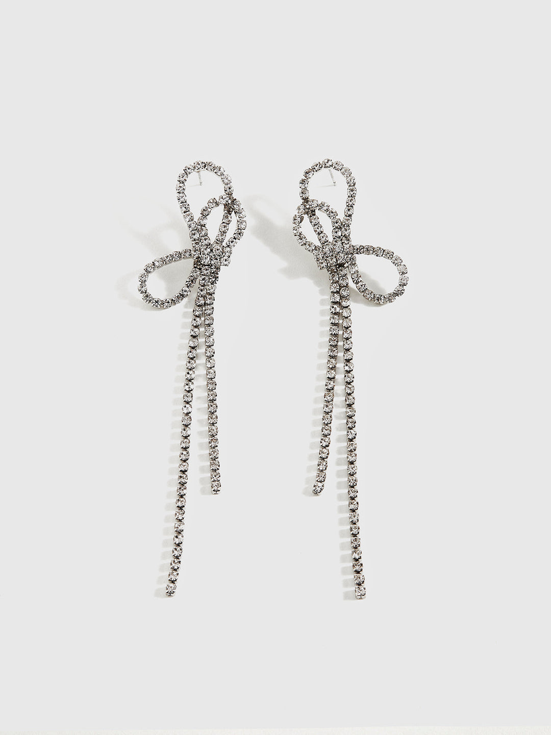 Boucles d'oreilles à franges avec nœud en strass