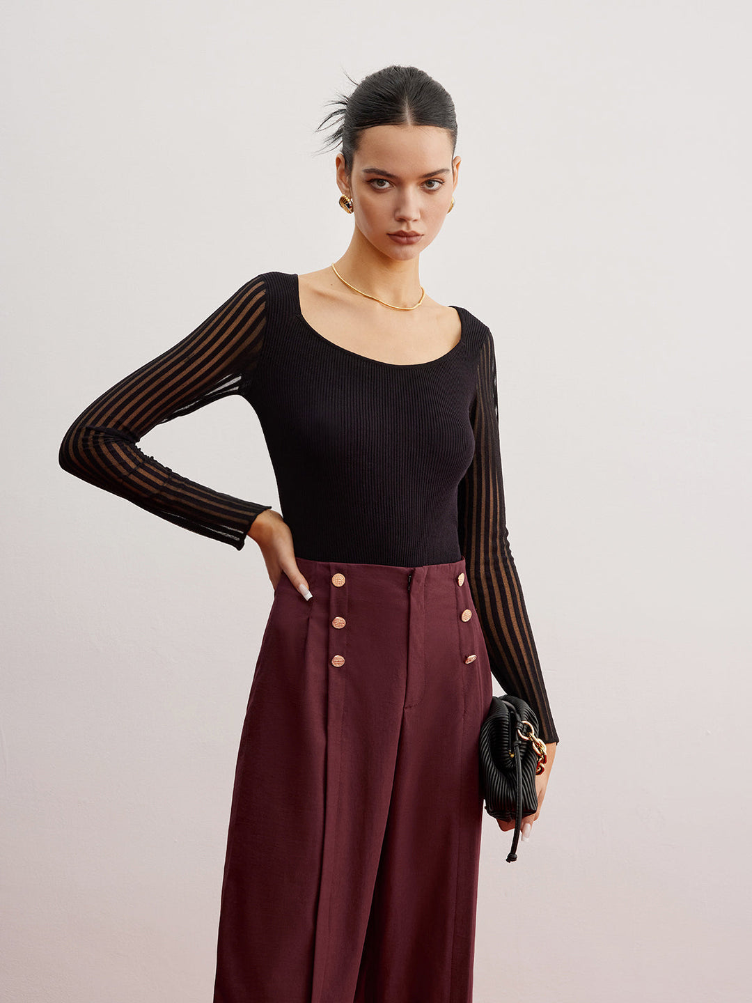 Pull en maille côtelée avec manches transparentes