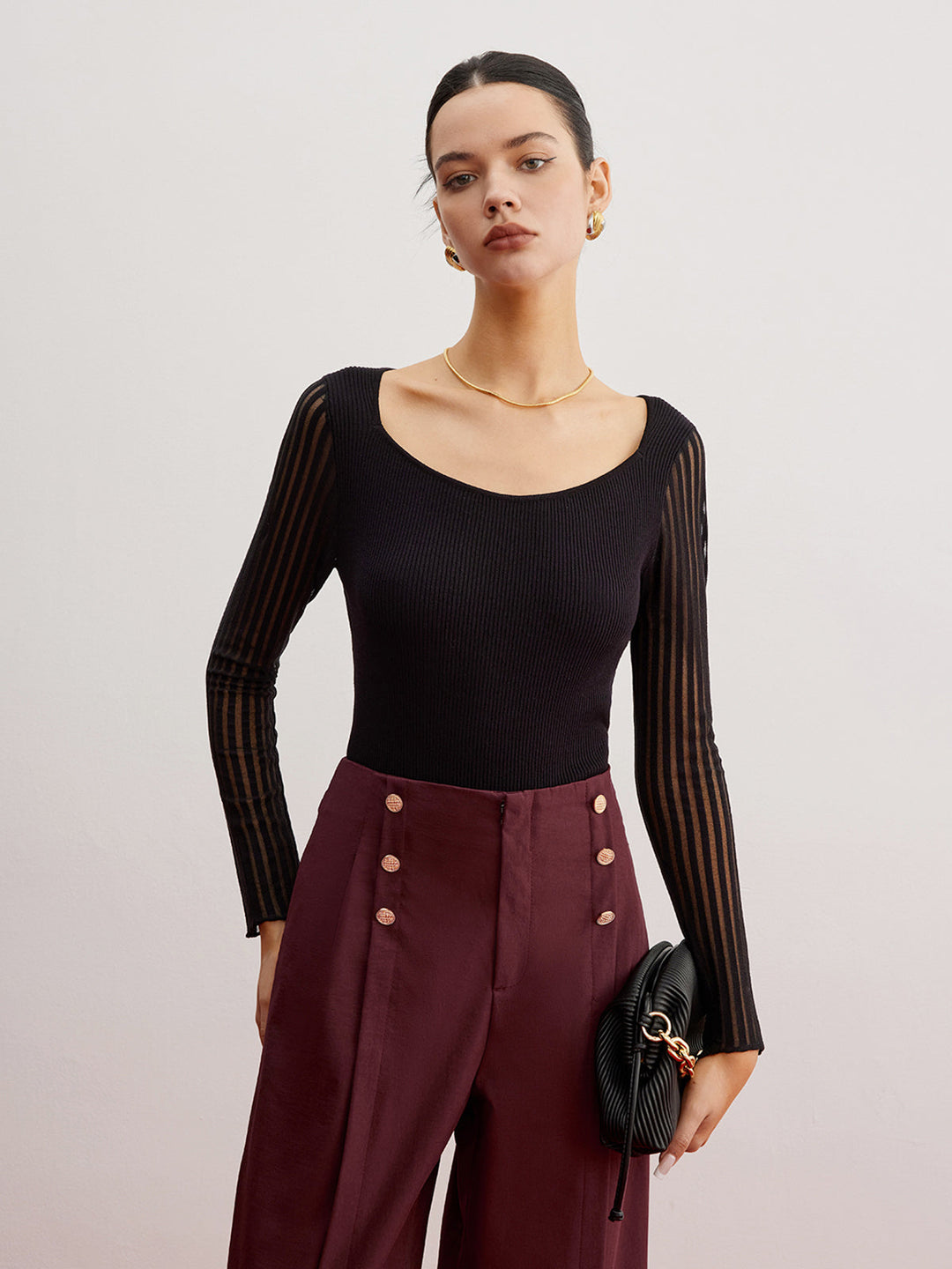 Pull en maille côtelée avec manches transparentes