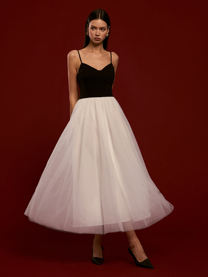 Robe mi-mollet en résille bicolore