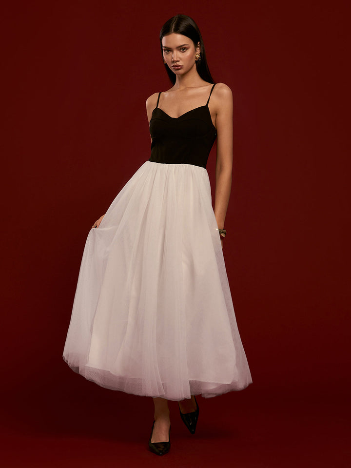 Robe mi-mollet en résille bicolore