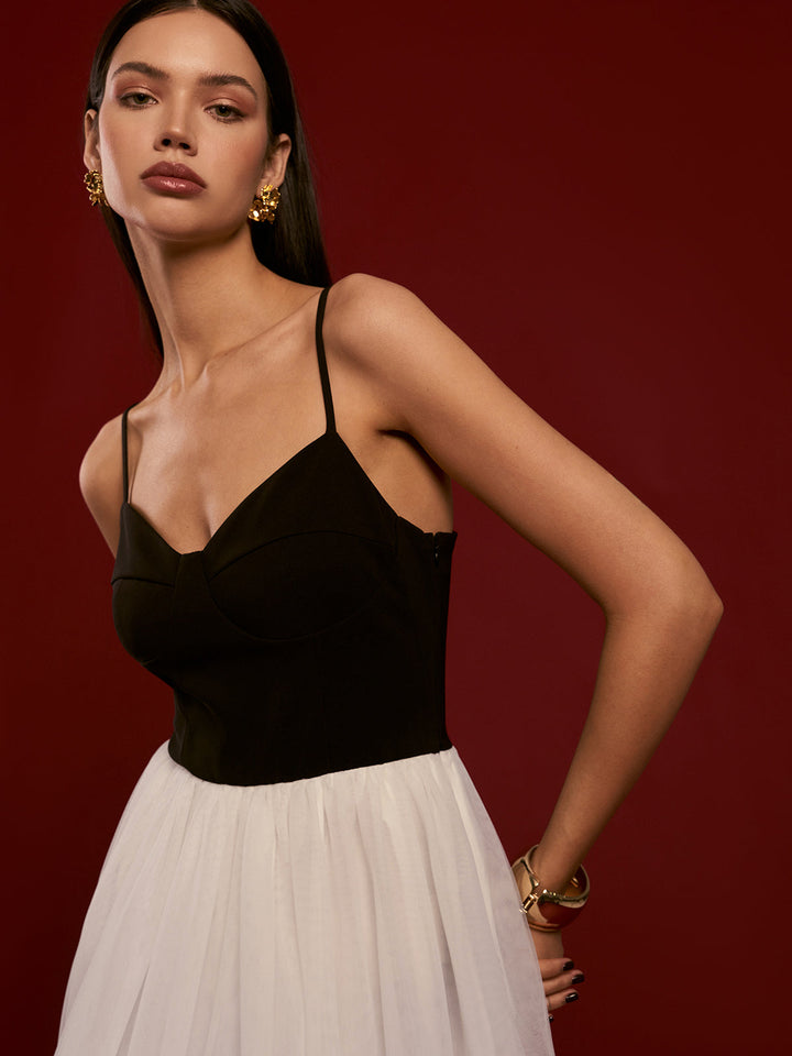 Robe mi-mollet en résille bicolore