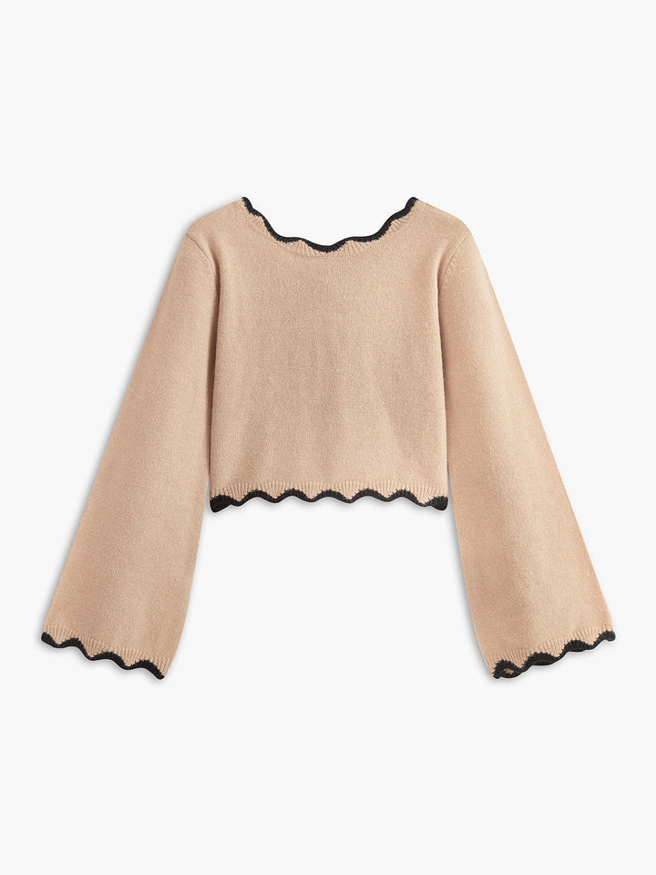 Pull à col contrasté avec nœud