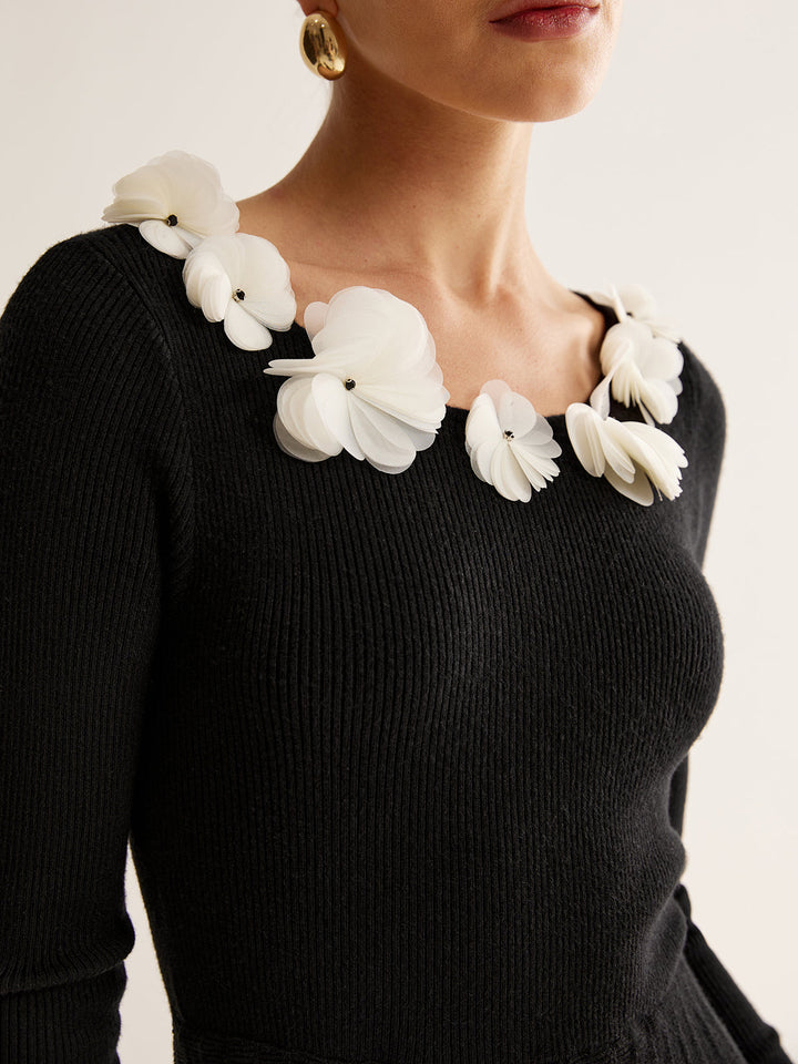 Robe pull plissée à fleurs