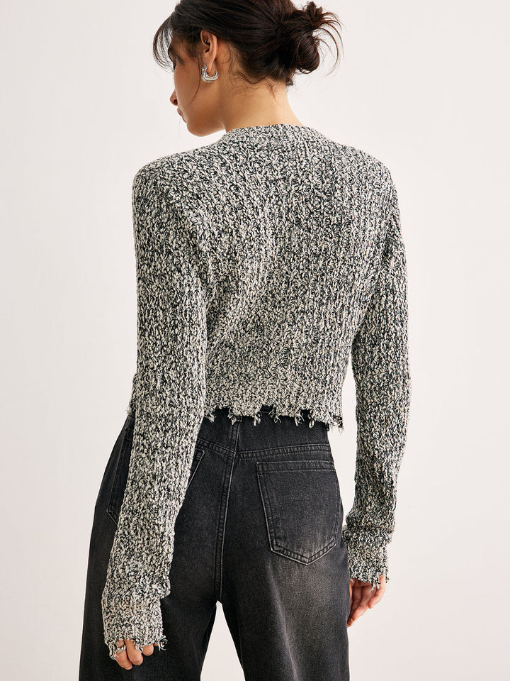 Haut en tricot ajusté à ourlet brut avec boutons