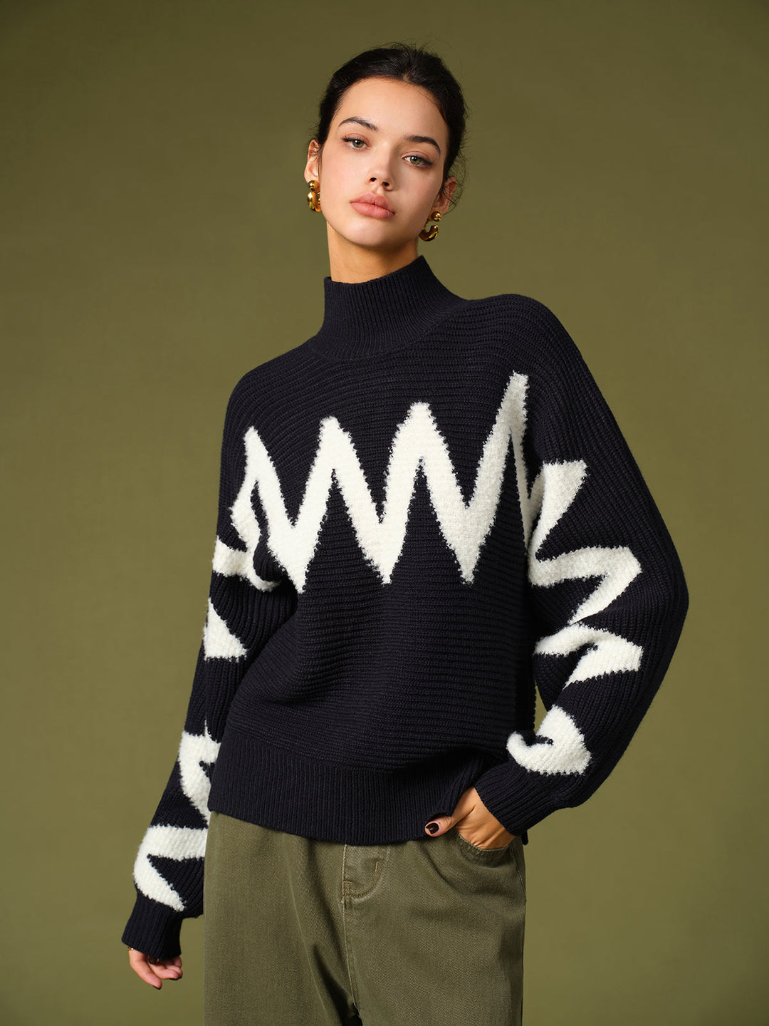 Pull à col roulé avec bordure contrastante