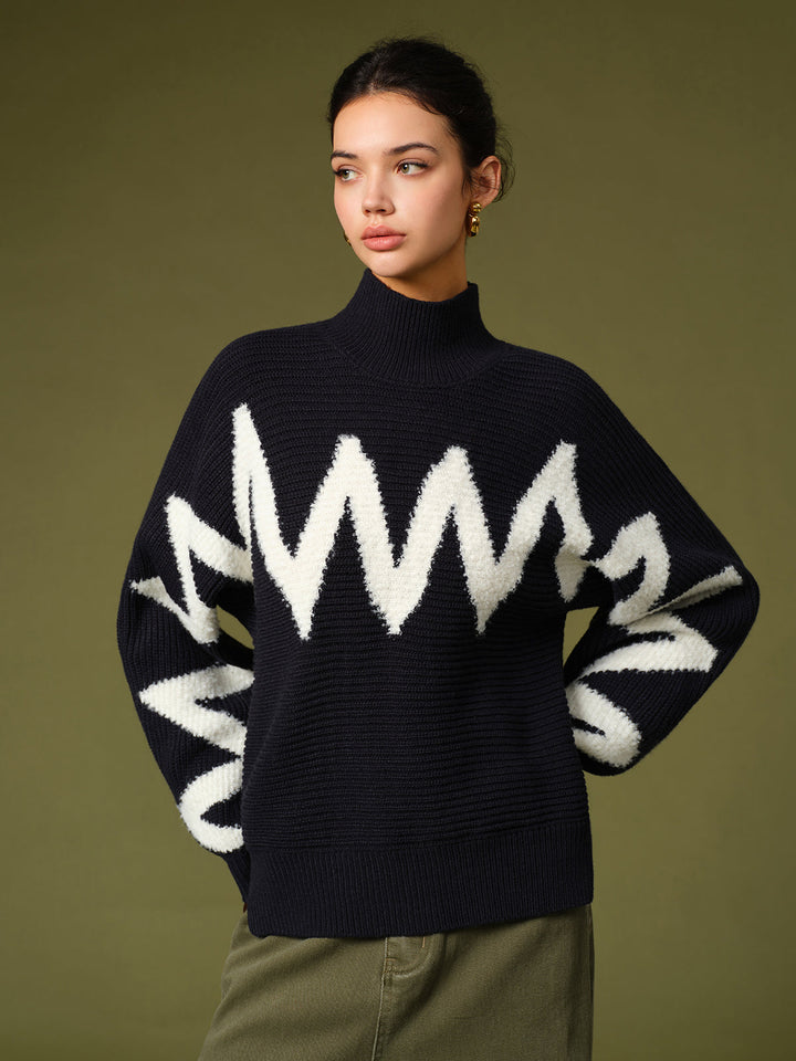 Pull à col roulé avec bordure contrastante