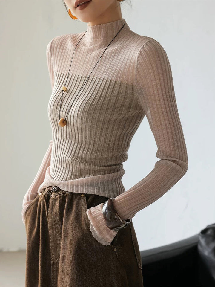 Pull à col roulé ajusté avec empiècements transparents