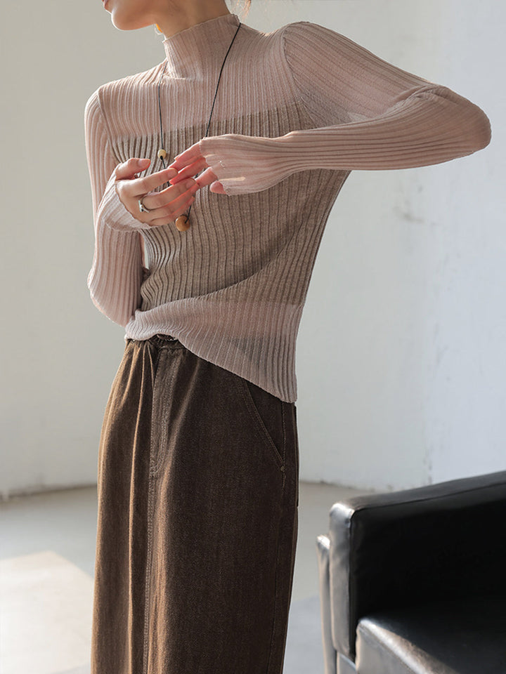 Pull à col roulé ajusté avec empiècements transparents