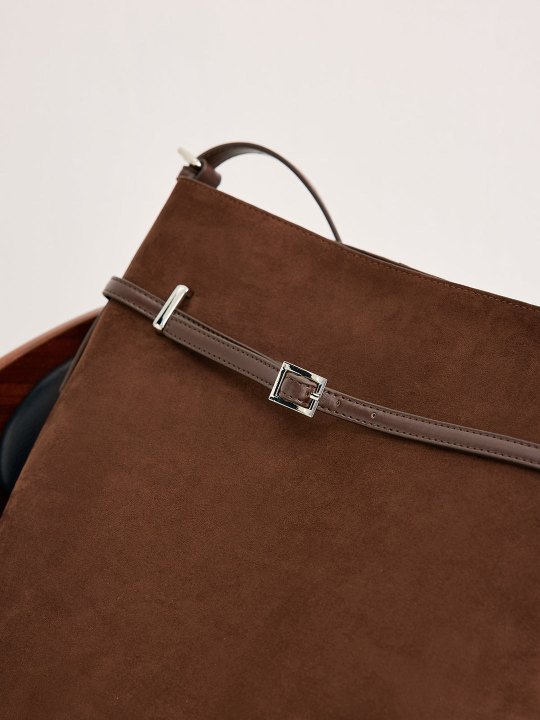 Sac seau à boucle polyvalent en daim