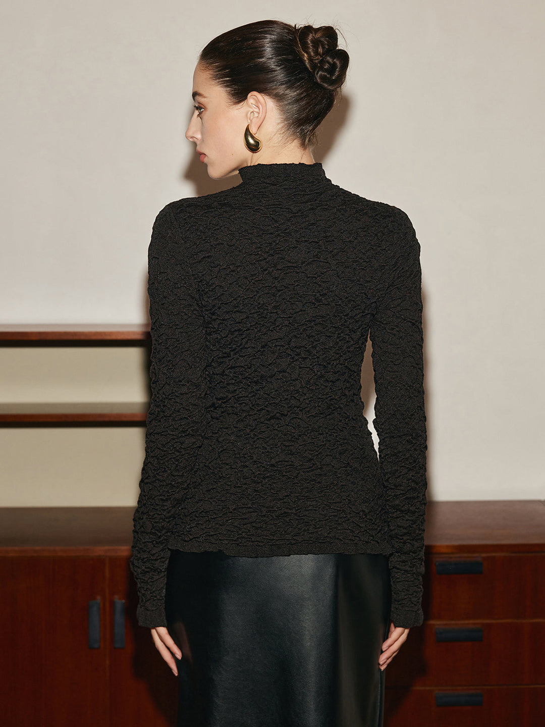 Pull en maille à bord festonné