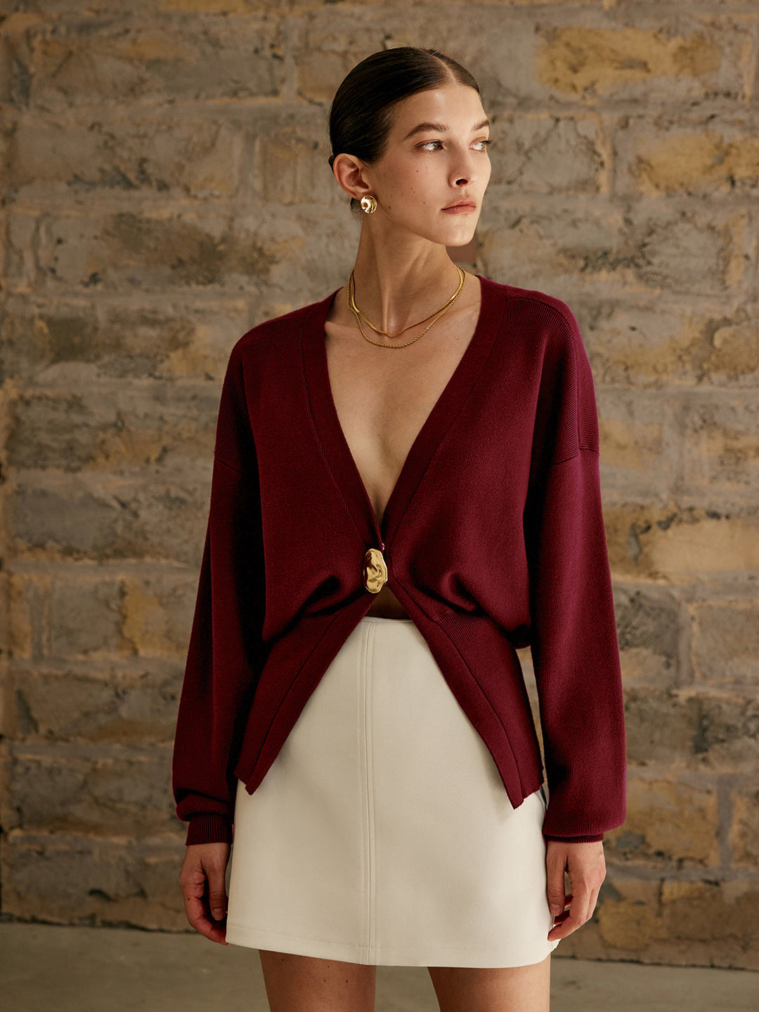 Cardigan uni à boutons dorés
