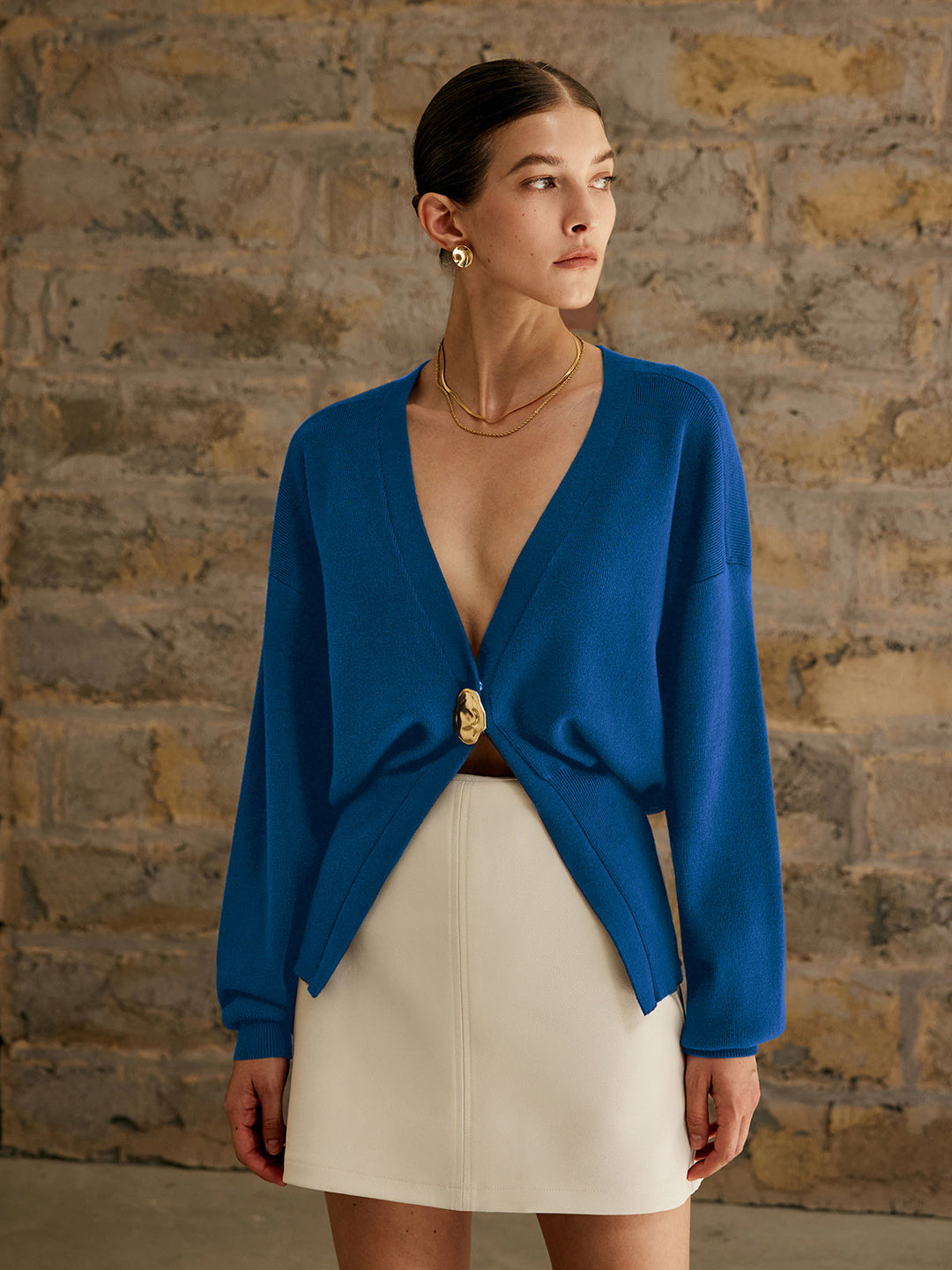 Cardigan uni à boutons dorés
