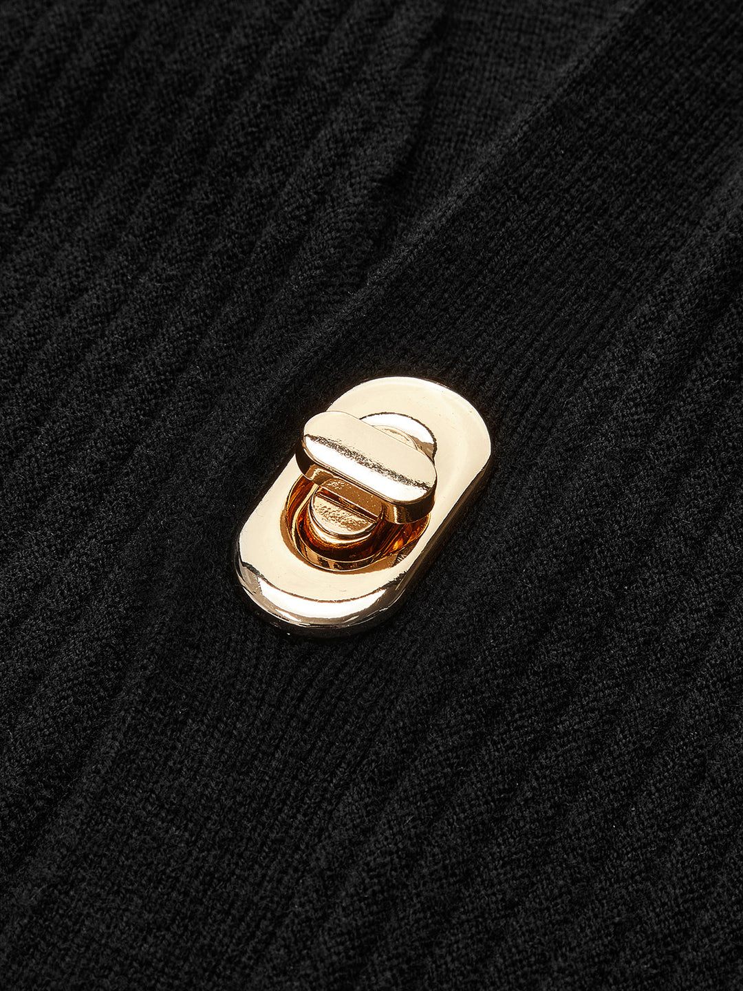 Cardigan à manches ondulées avec fermoir à torsion