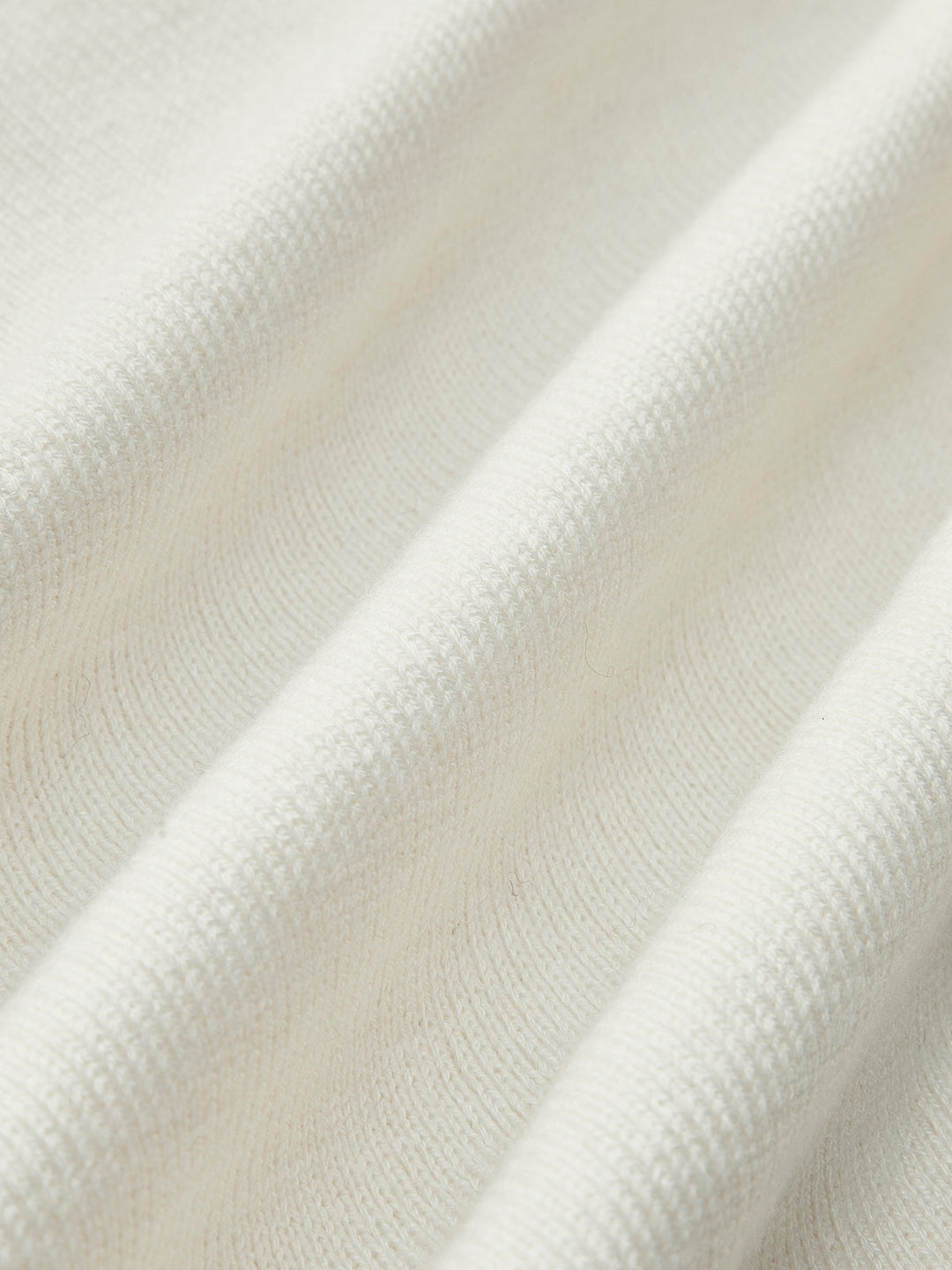 Haut en maille asymétrique en mélange de laine