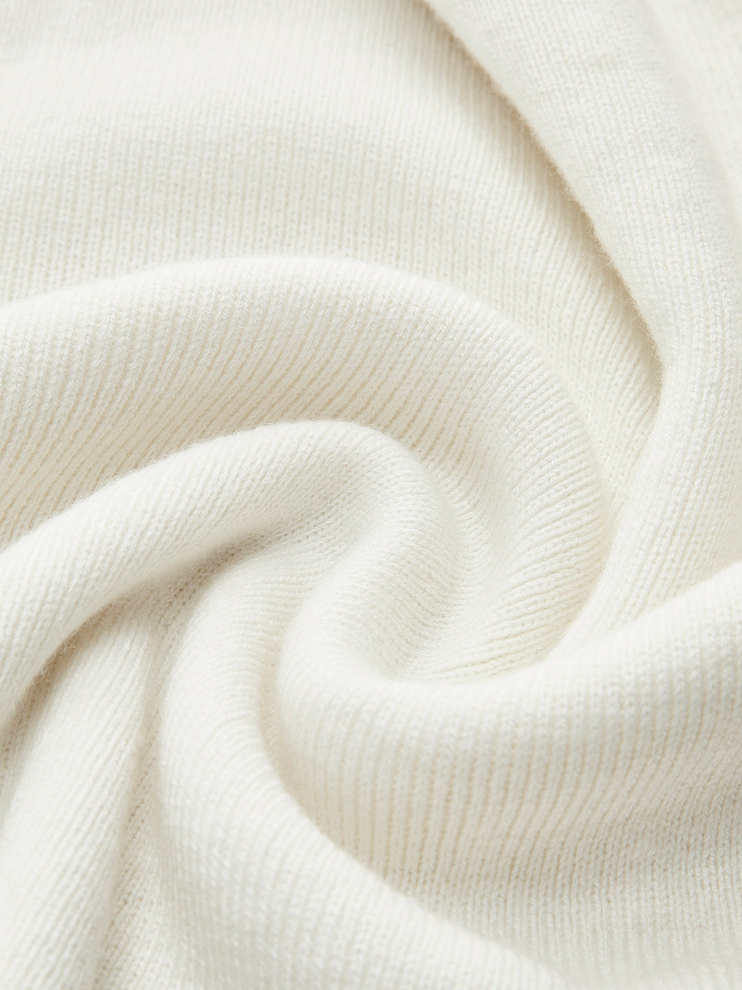 Haut en maille asymétrique en mélange de laine