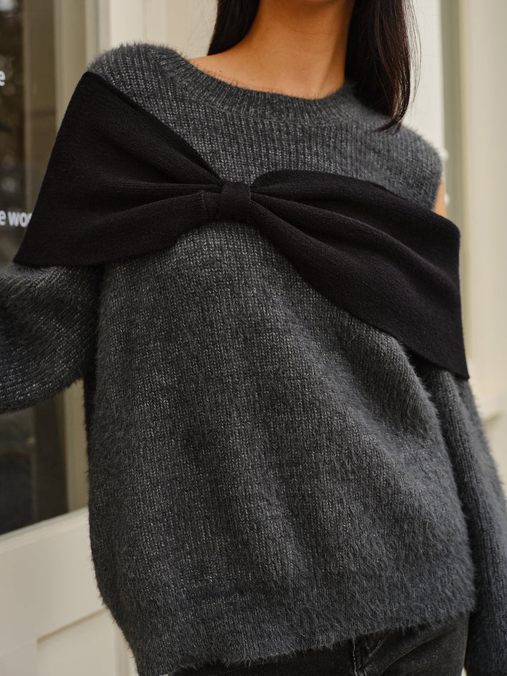 Pull à col rond avec découpe et nœud