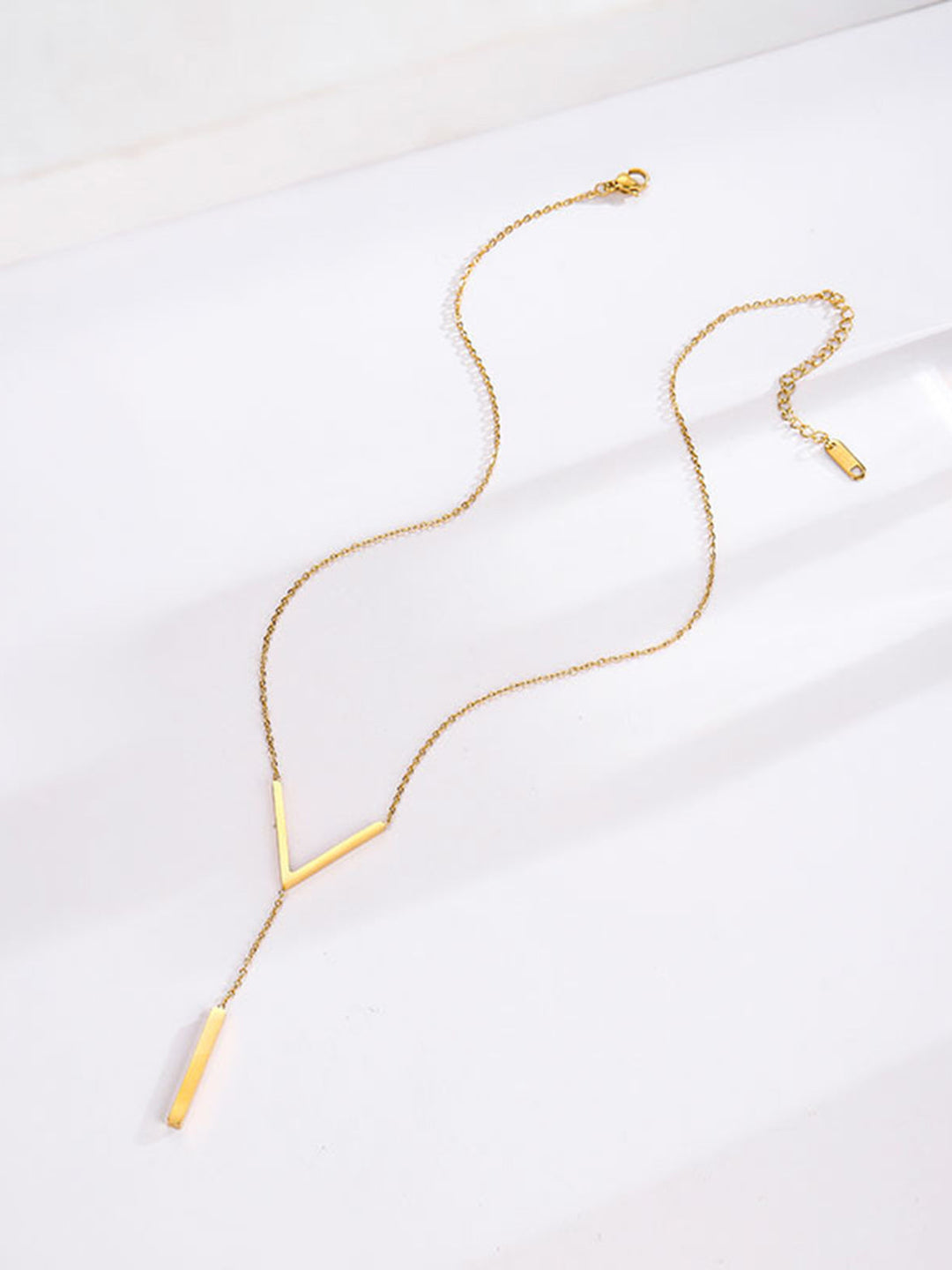 Collier à pendentif géométrique