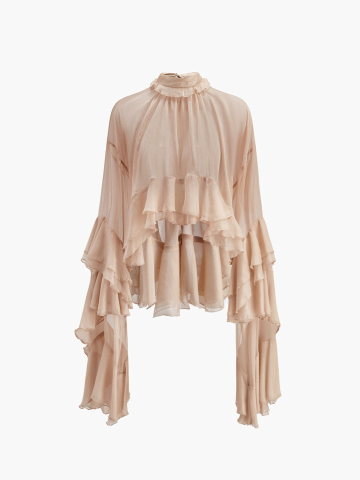 Blouse en mousseline à volants et col roulé transparent