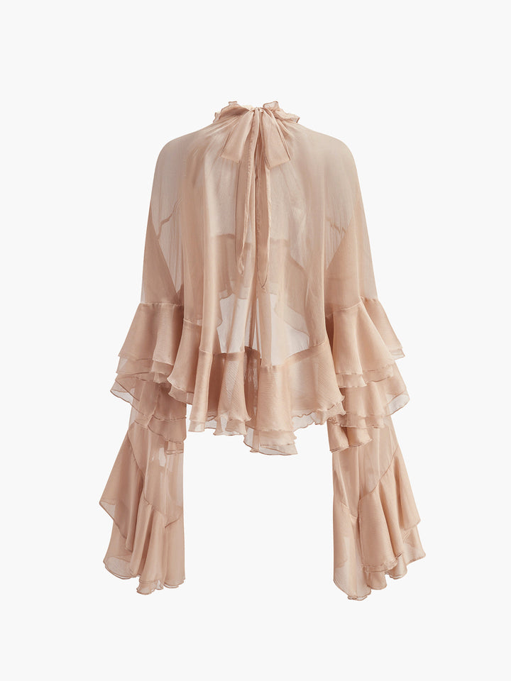 Blouse en mousseline à volants et col roulé transparent