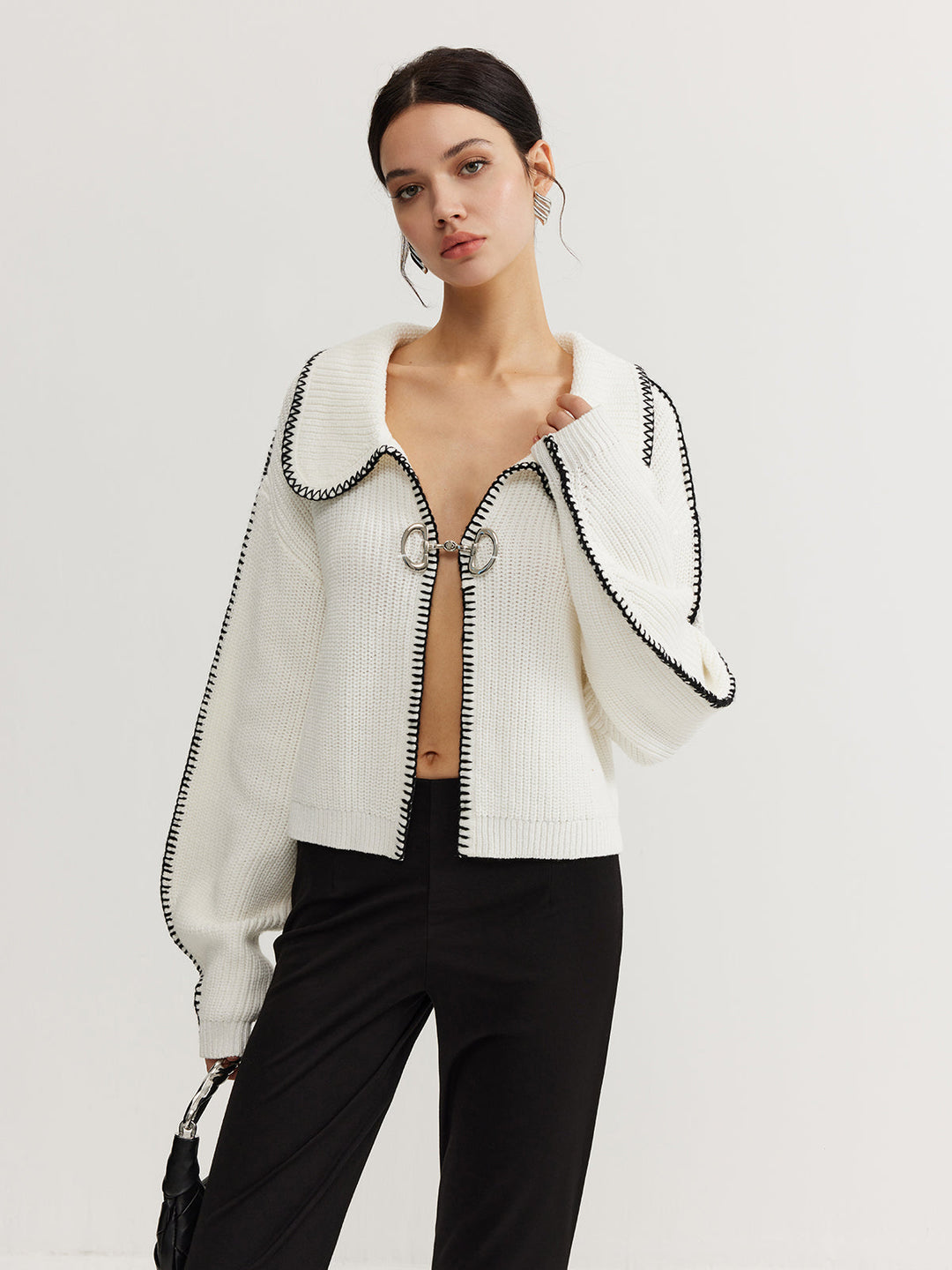 Haut en tricot à fermeture magnétique avec bordure contrastée