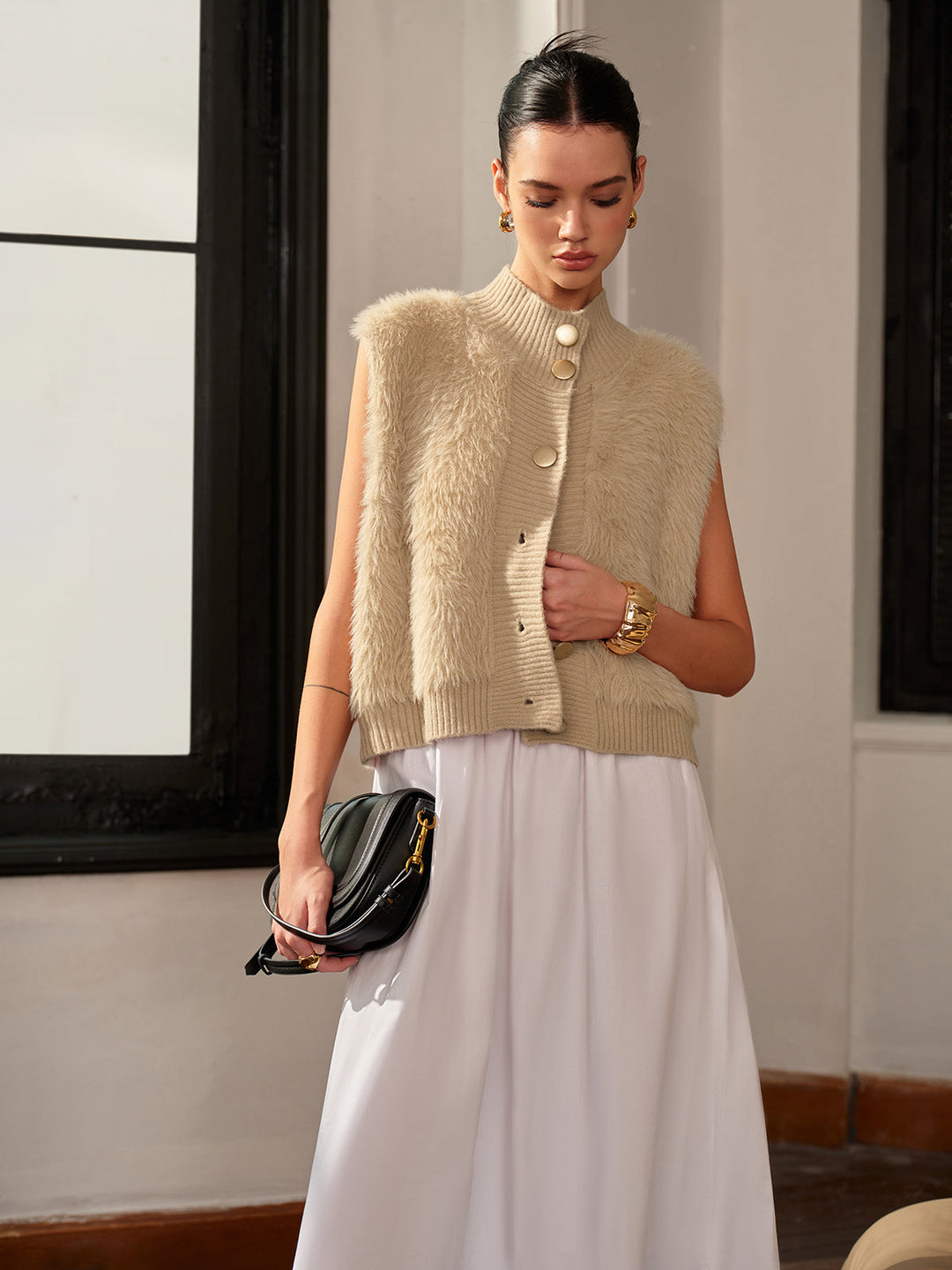 Gilet bouffant à col montant et boutons