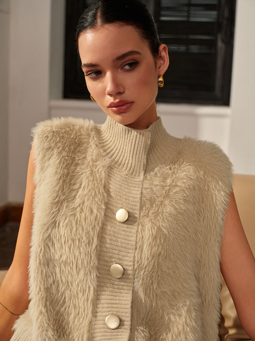 Gilet bouffant à col montant et boutons