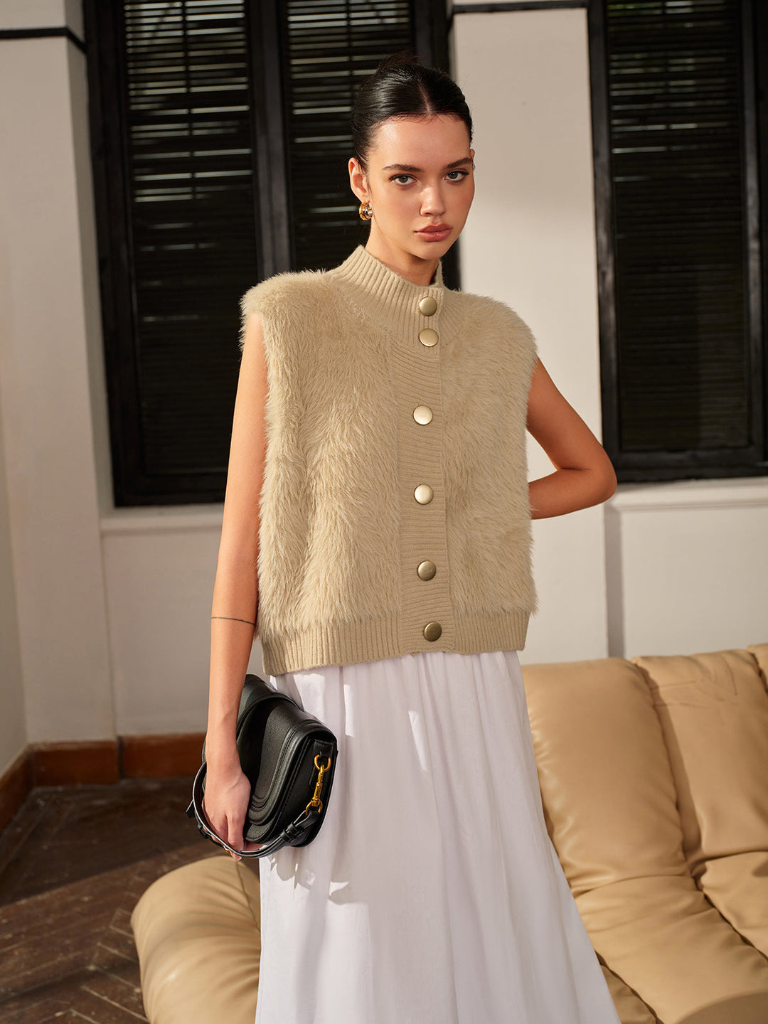 Gilet bouffant à col montant et boutons