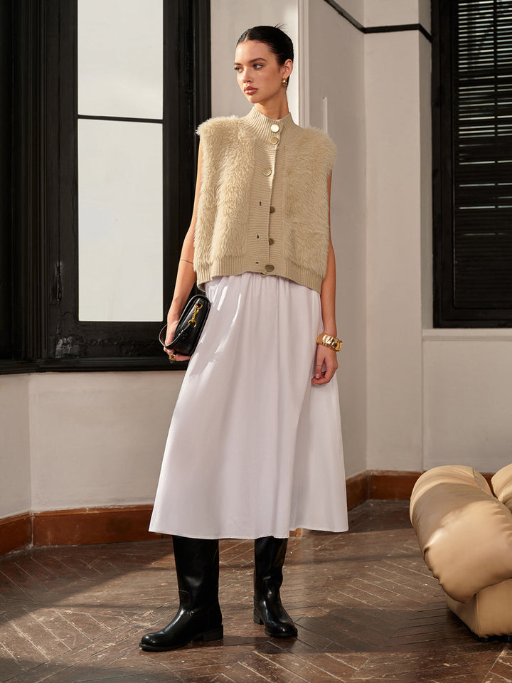 Gilet bouffant à col montant et boutons