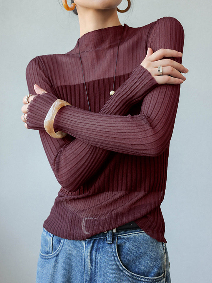 Pull à col roulé ajusté avec empiècements transparents