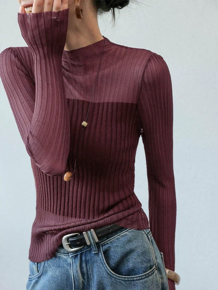 Pull à col roulé ajusté avec empiècements transparents