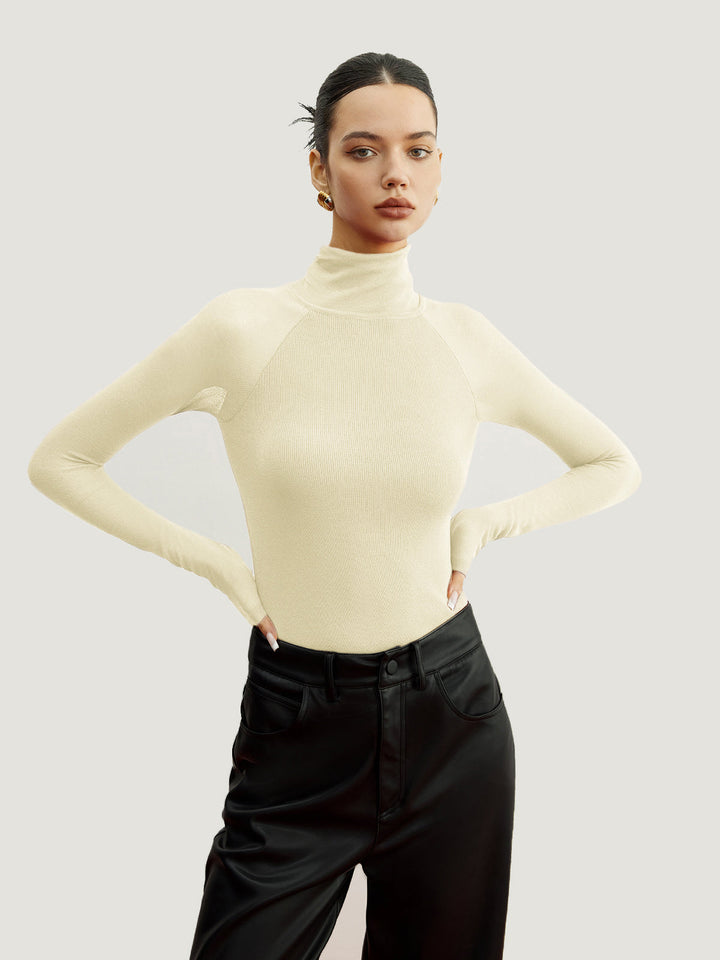 Pull ajusté à manches transparentes