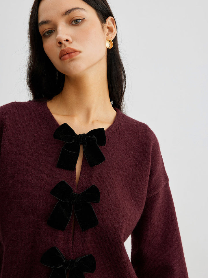 Sweater à manches lanterne avec nœud en velours