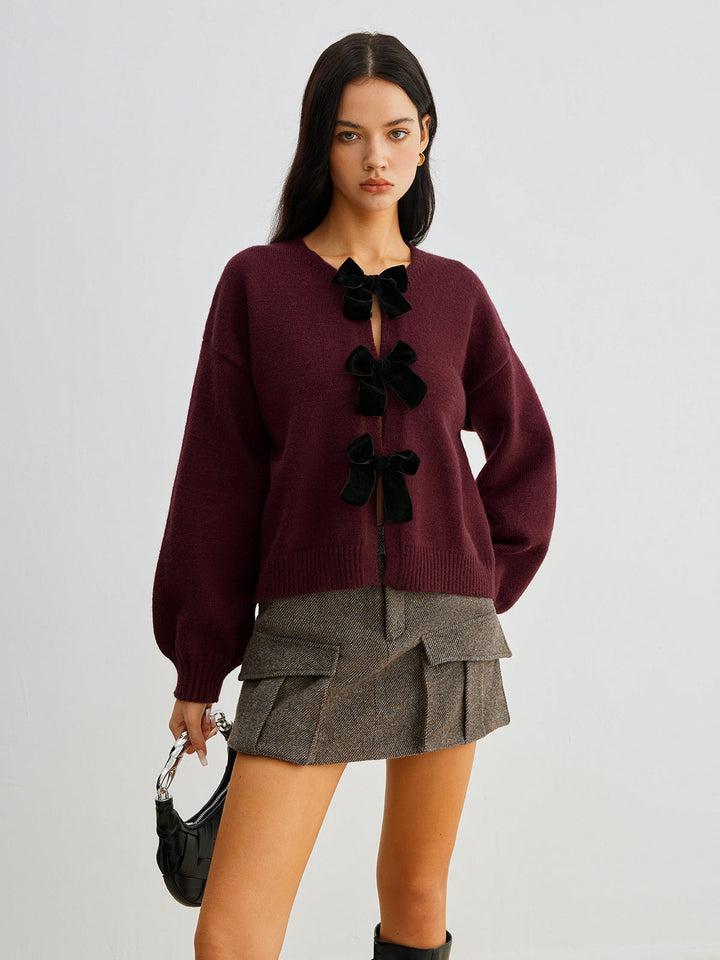 Sweater à manches lanterne avec nœud en velours