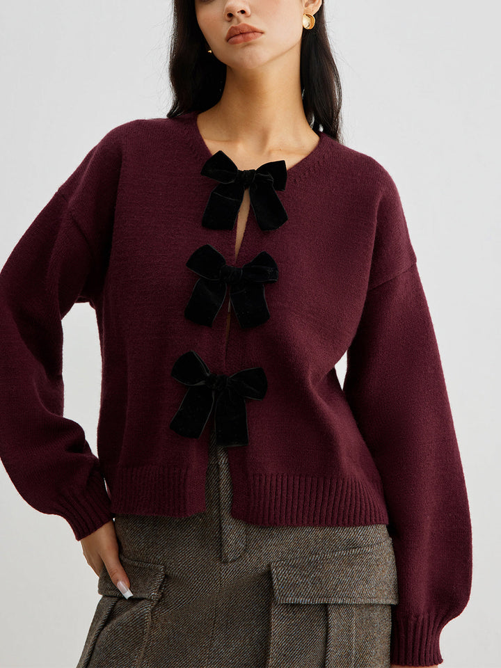 Sweater à manches lanterne avec nœud en velours