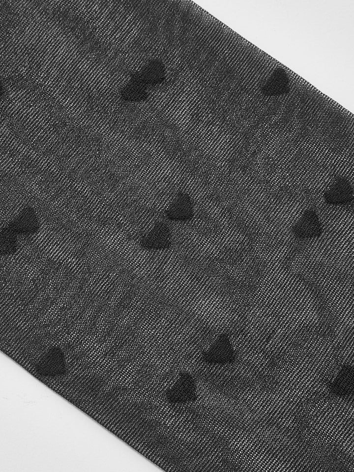 Collants transparents à motif cœur