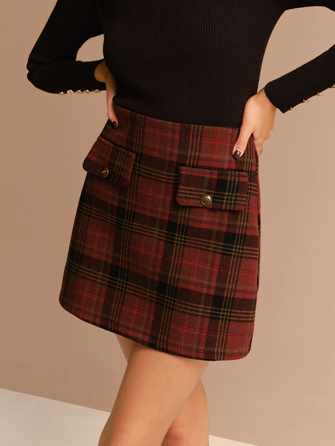 Jupe mini à carreaux en tweed