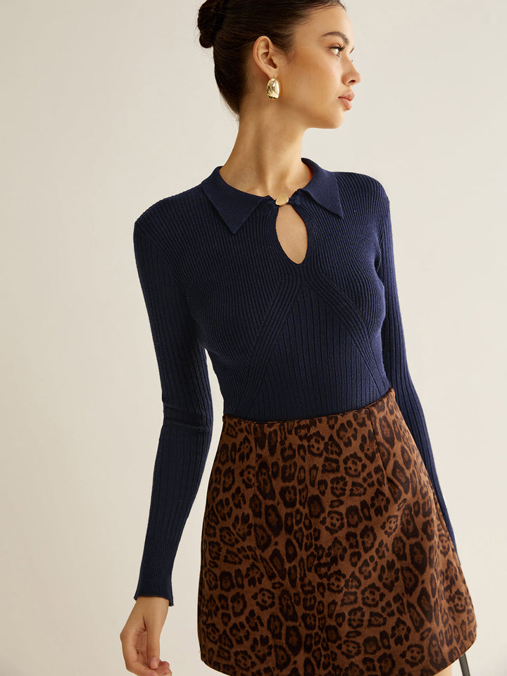 Pull à col polo avec trou de serrure côtelé