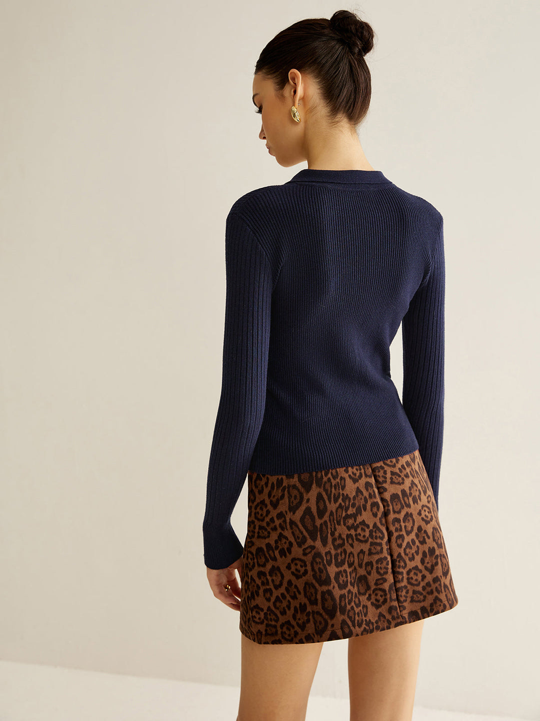 Pull à col polo avec trou de serrure côtelé