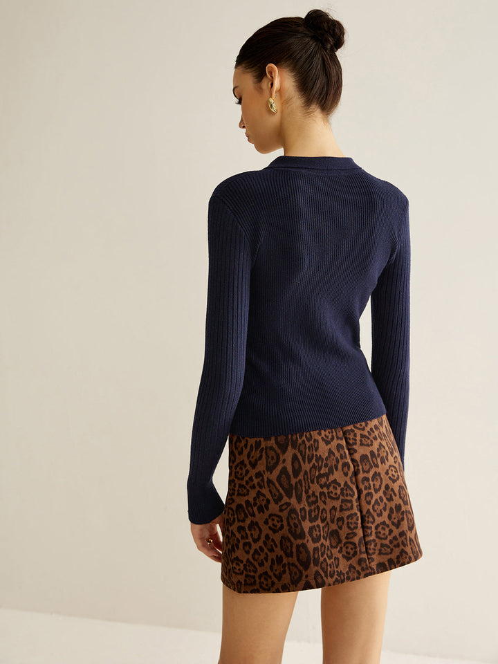 Pull à col polo avec trou de serrure côtelé