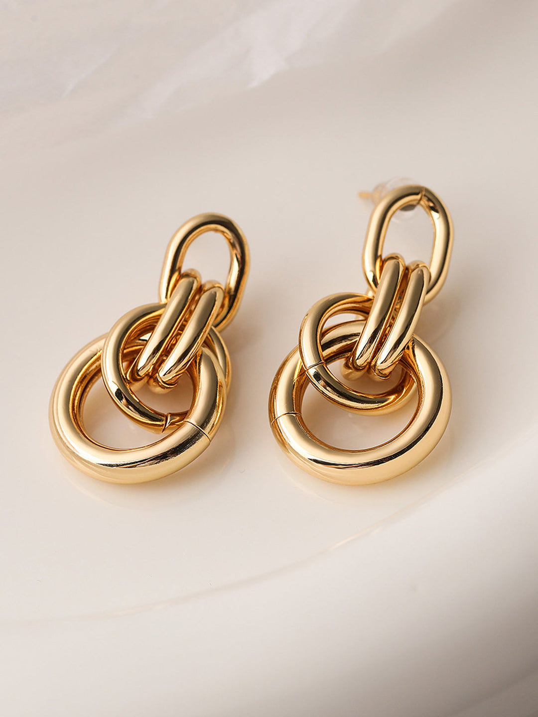 Boucles d'oreilles créoles torsadées