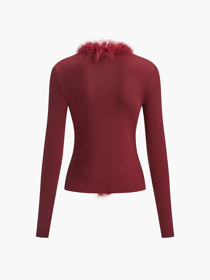 Pull ajusté en laine mélangée avec garniture en plumes