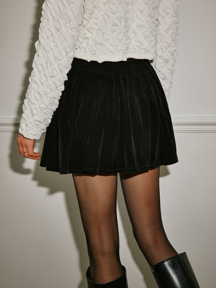 Jupe plissée forme parasol mi-taille