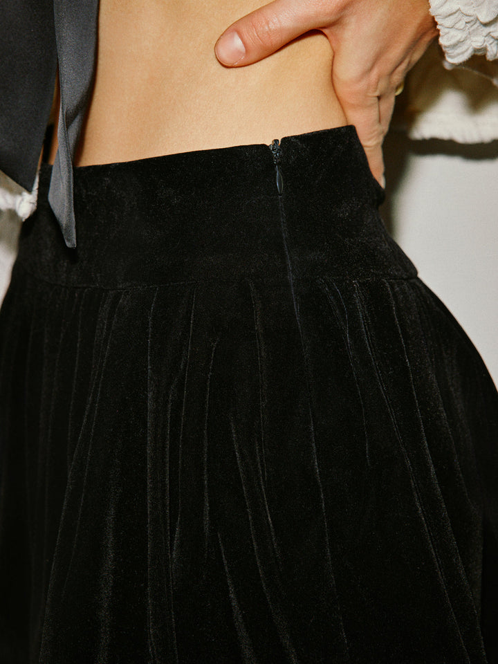 Jupe plissée forme parasol mi-taille